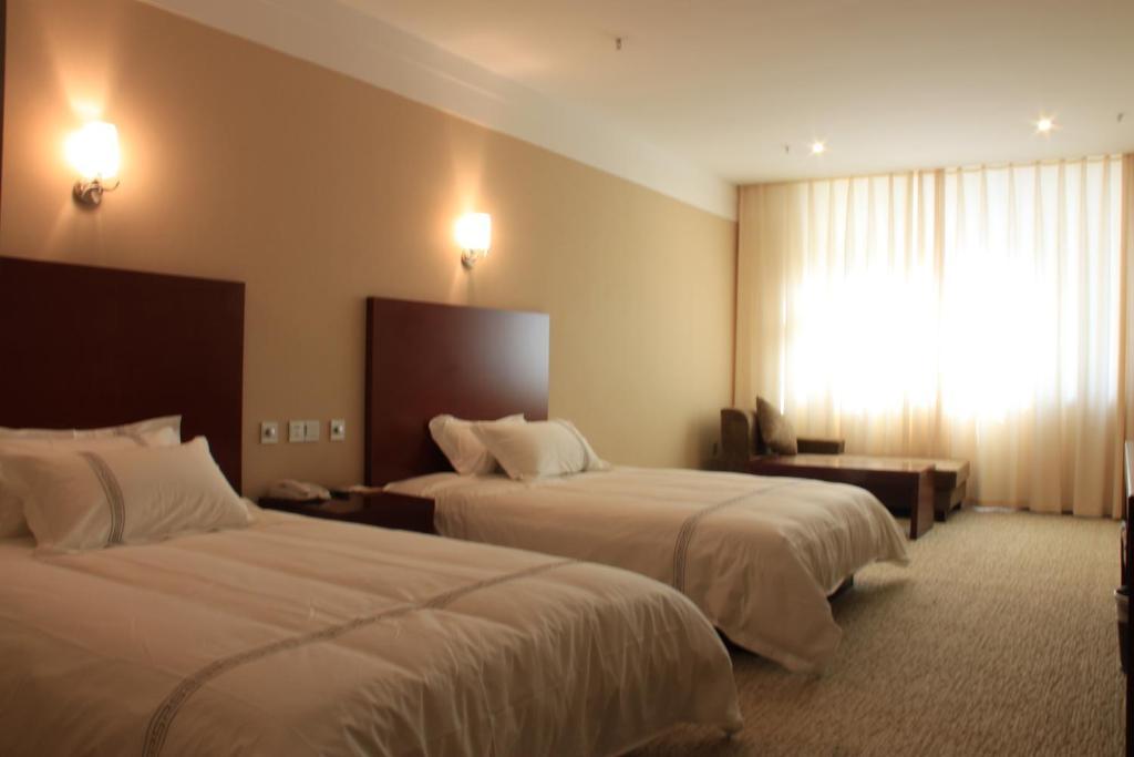 Zhou Wang Cheng Hotel ลั่วหยาง ห้อง รูปภาพ